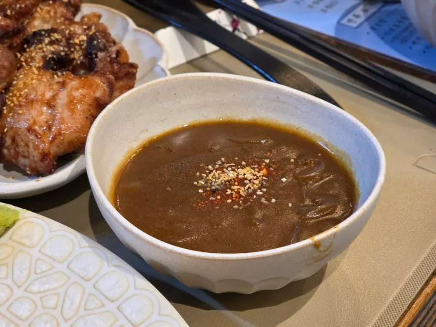 Complimentary rice and doenjang soup