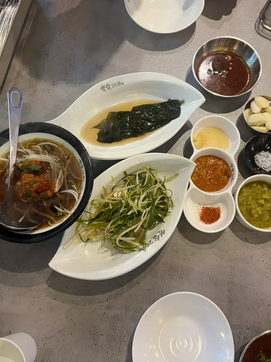 Basic side dish spread including rice noodles and minari-namul