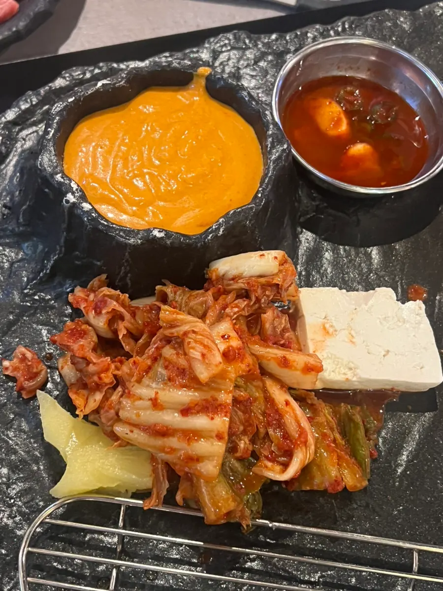 Kimchi, pineapple, and tofu on the stone grill