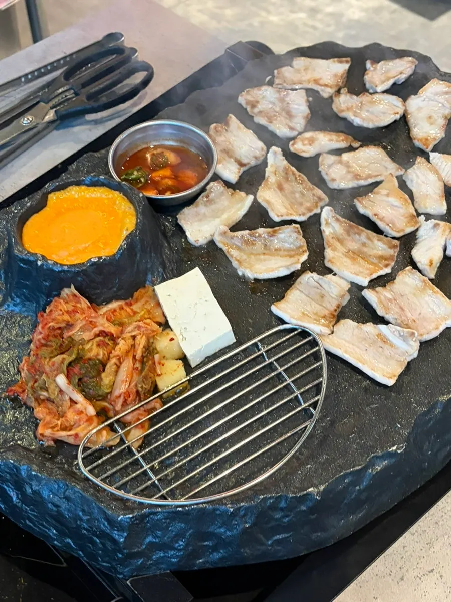 Mixed platter of pork belly, pork neck, and cheongyeopsal
