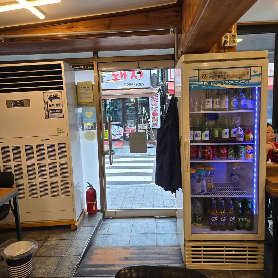 Inside Daseon Kalguksu with hanging aprons