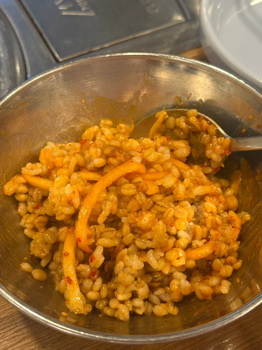 Bowl of barley rice served as a default side