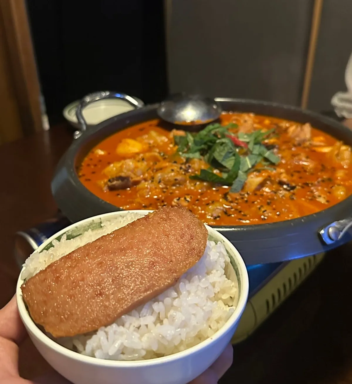 Steamed rice topped with a slice of Spam