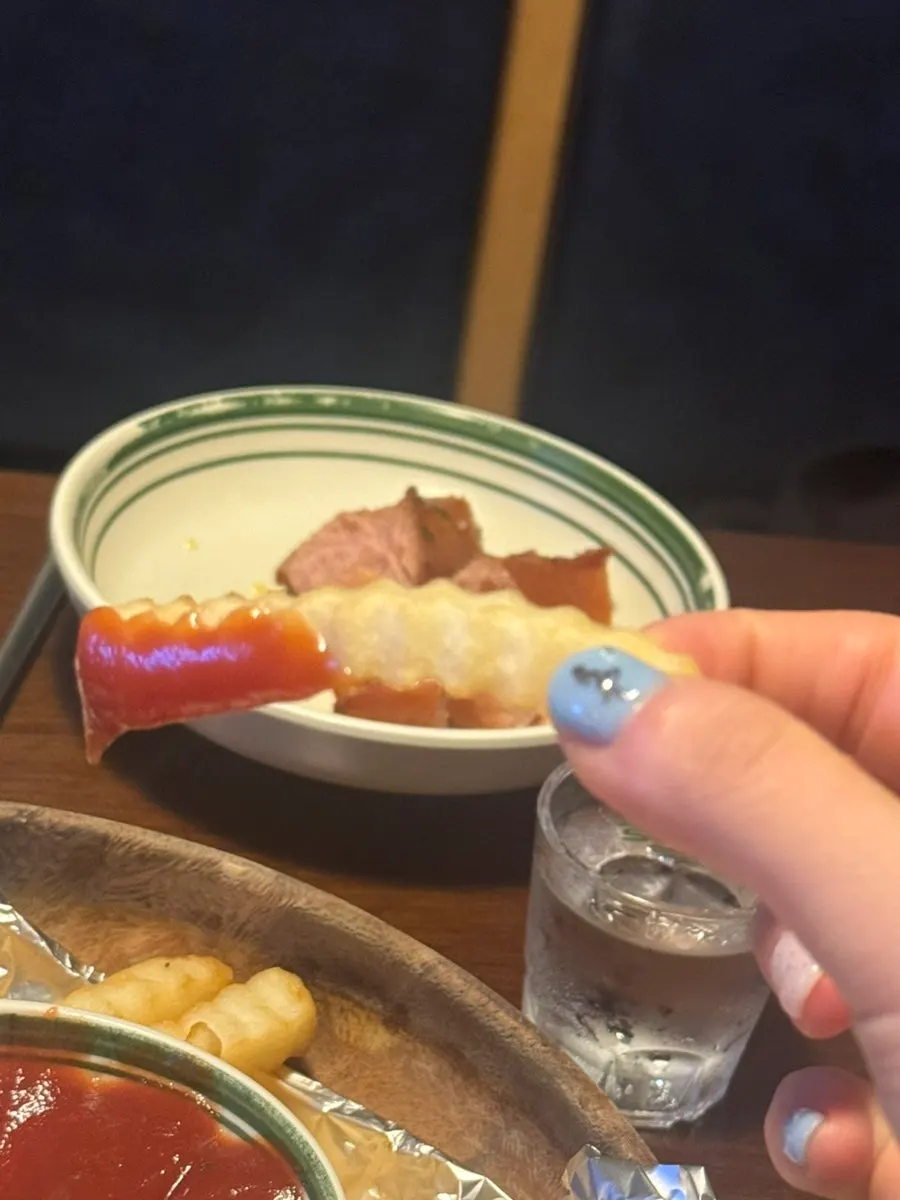 Food piled on a spoonful of rice