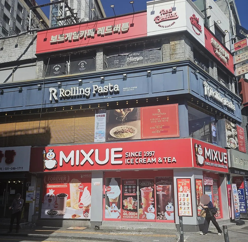 Store entrance on the 2nd floor across from Suwon Station Exit 12