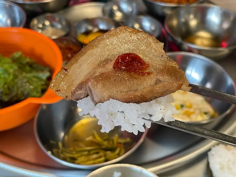 A full spread of golden-grilled frozen pork belly