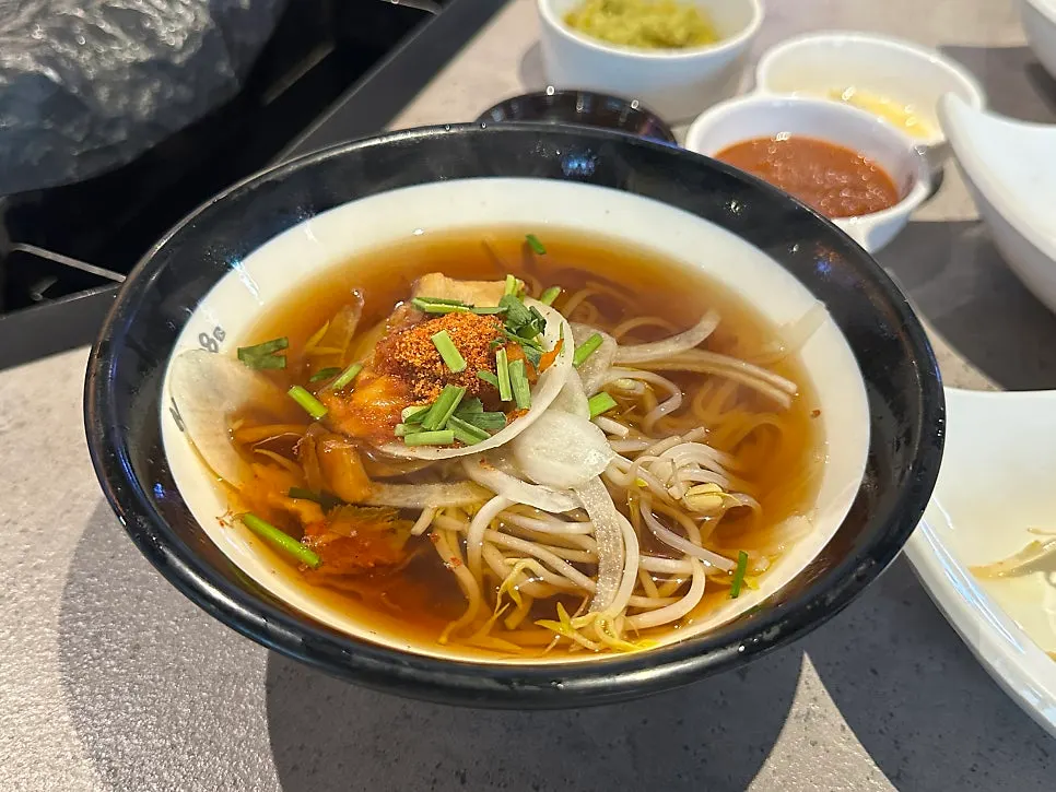 Tofu kimchi and rice noodle soup served as the basic setting