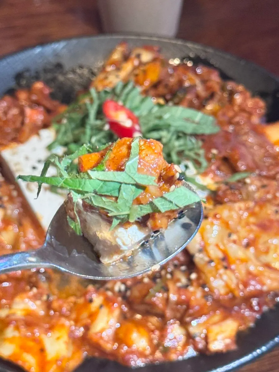 Spicy pork and kimchi with tofu, meat, and kimchi