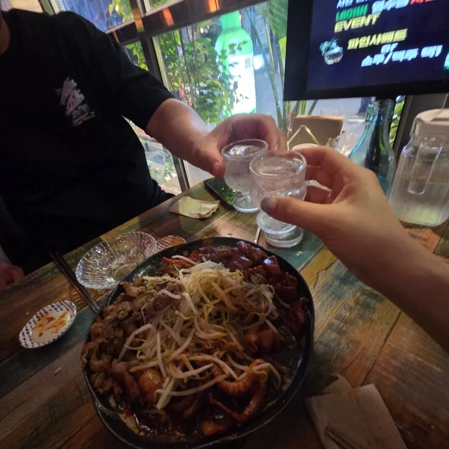 A piece of octopus placed on top of the rice ball