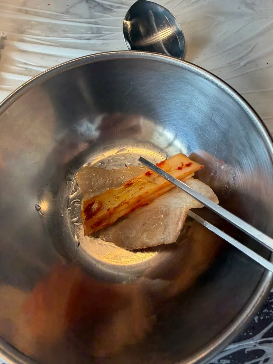 4mm frozen pork belly cooking on the grill