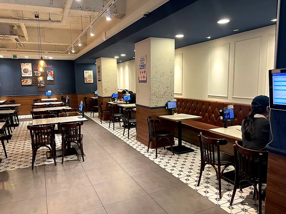 Clean-looking seating deeper inside the restaurant