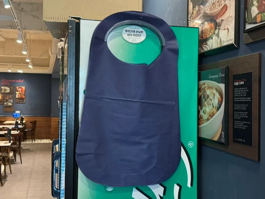 Menu board listing single items and set menus