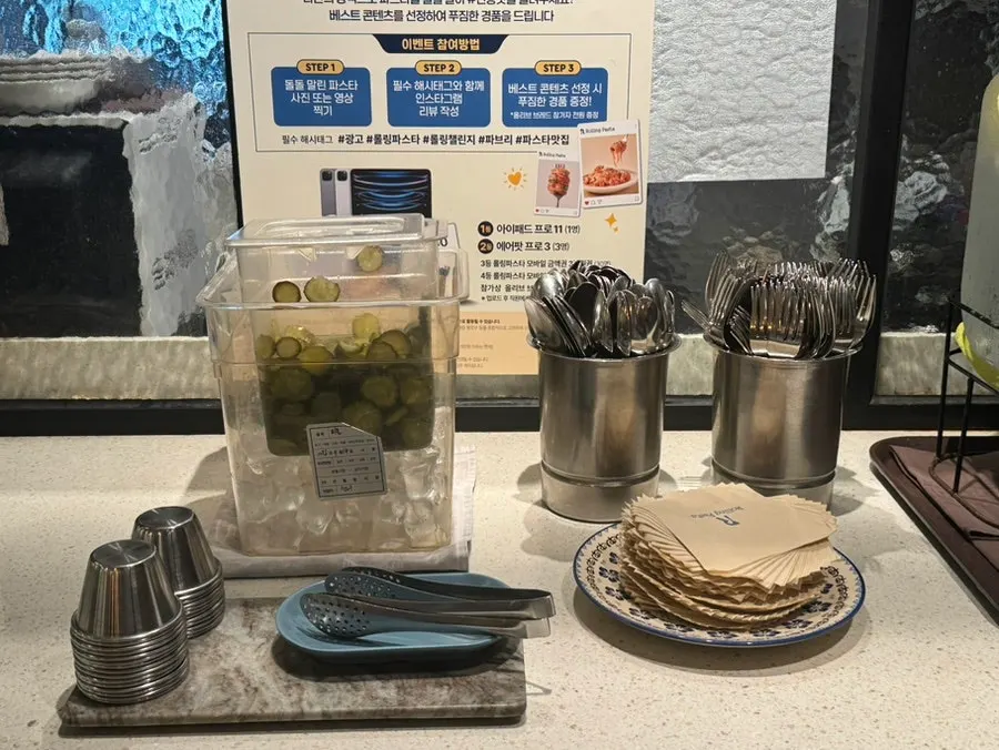 Cups and water at the self-bar