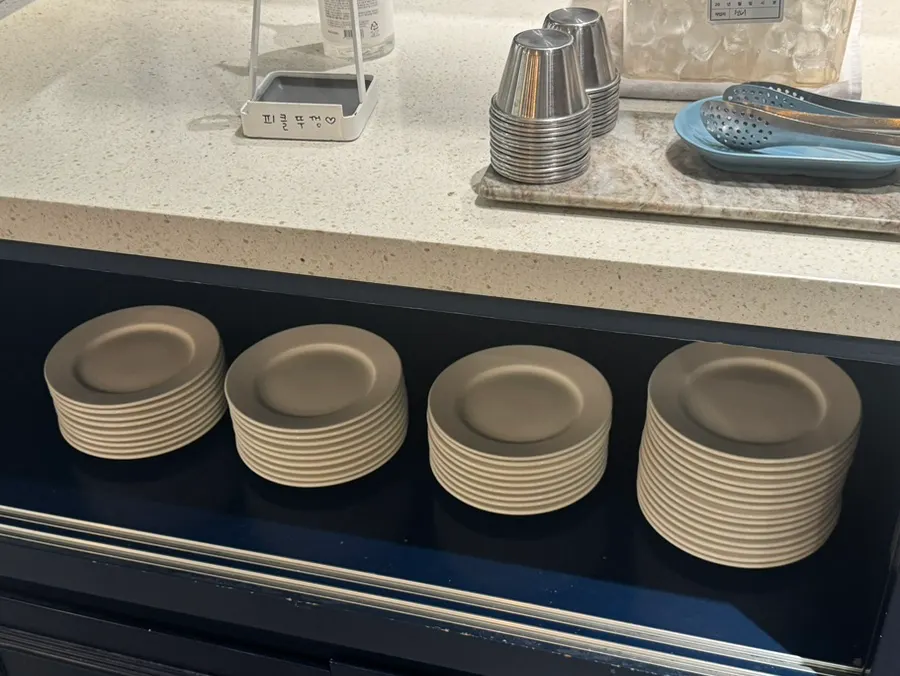Utensils and pickle corner at the self-bar