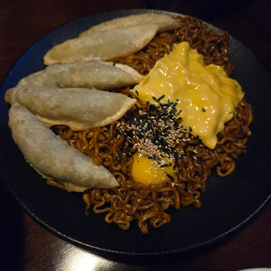 A bowl of sausage kimchi fried rice