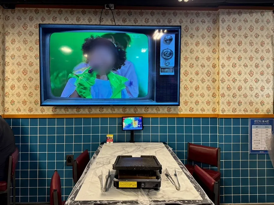 Spacious dining hall filled with customers