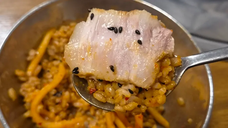 A tender piece of boiled pork on a plate