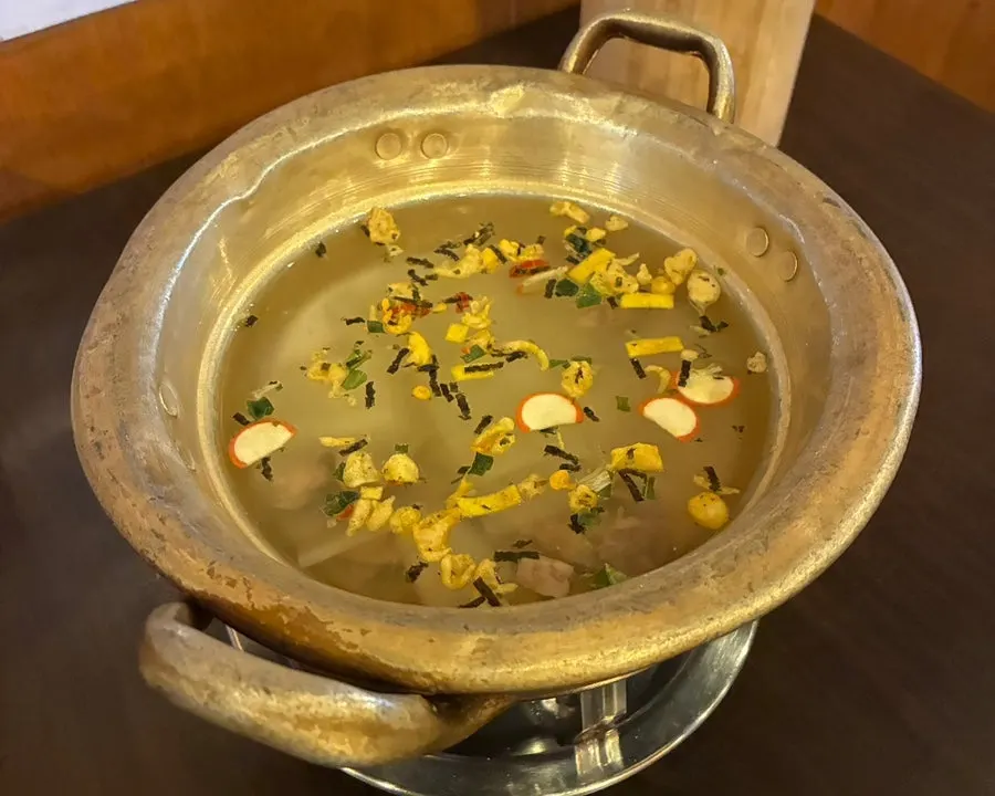Beef radish soup served on a mini brazier