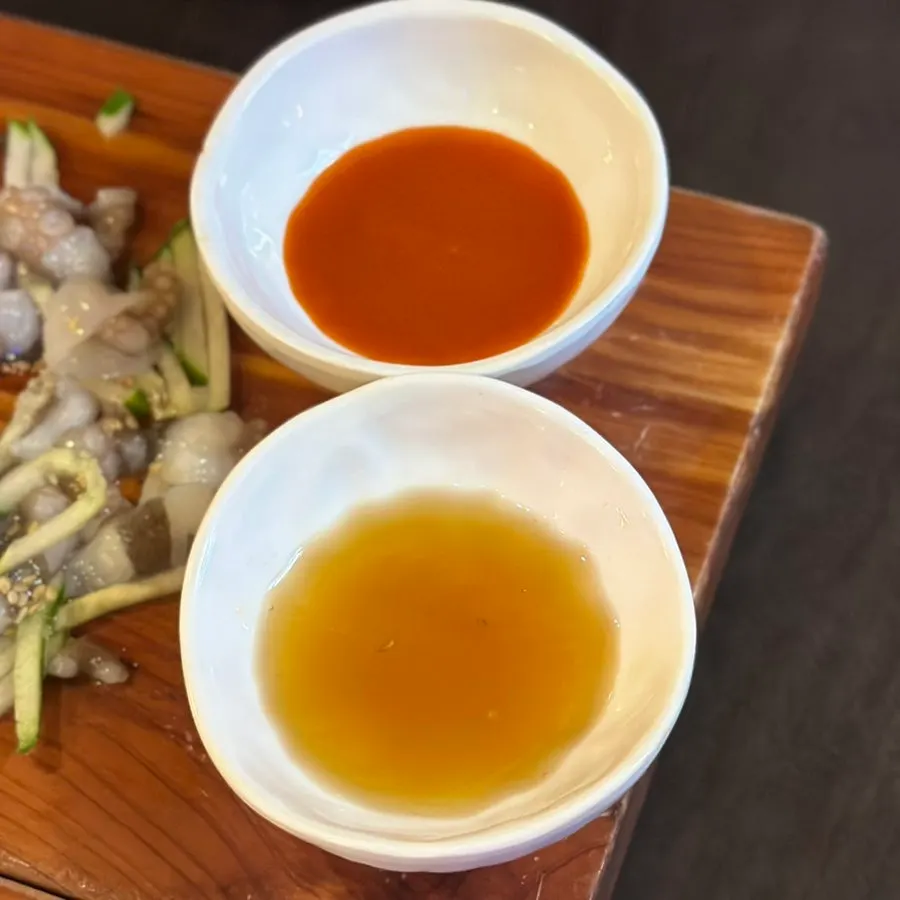 Plate of moving live octopus