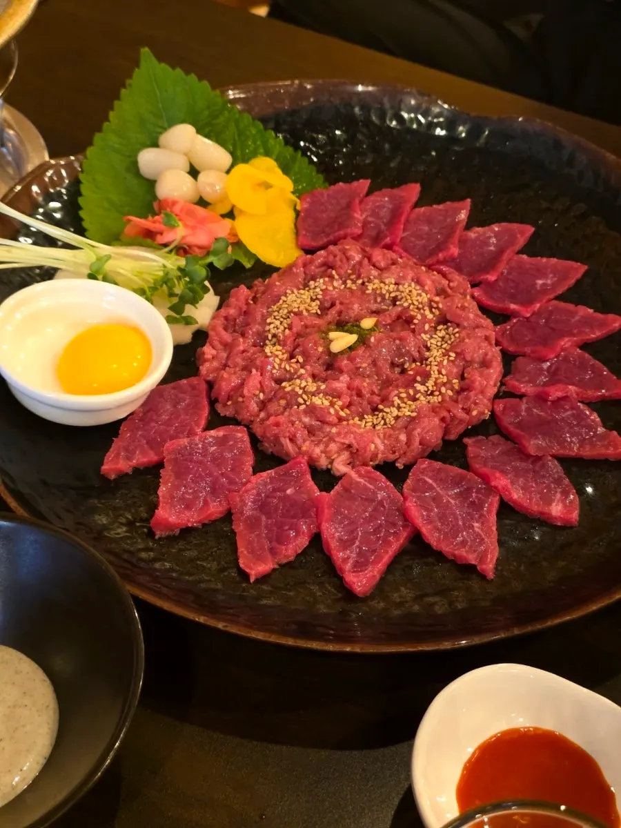 Korean beef sashimi served with sesame oil