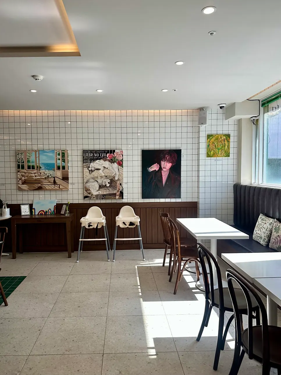 Café interior with floor-to-ceiling windows