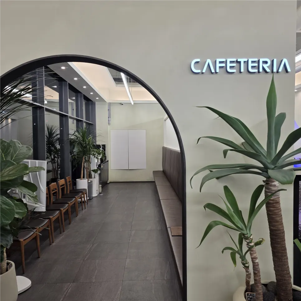 Cafeteria-style seating area to the left of the entrance