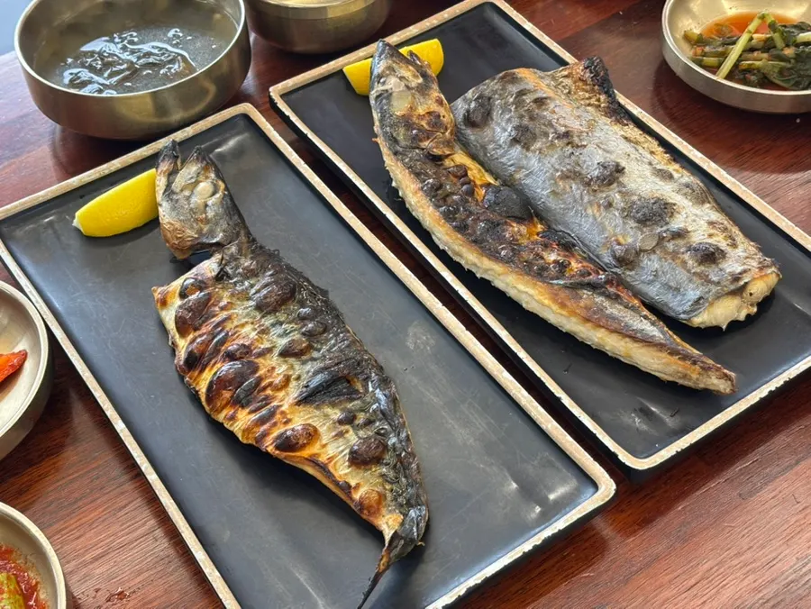 Wood-fired grilled mackerel served on a plate