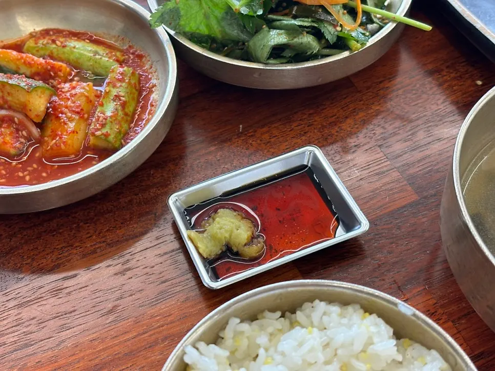 Wood-fired grilled fish dipped in soy sauce and wasabi