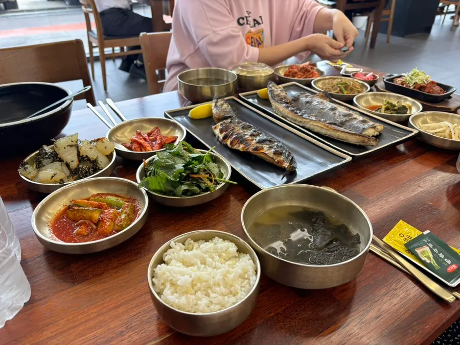 A full table spread with various side dishes
