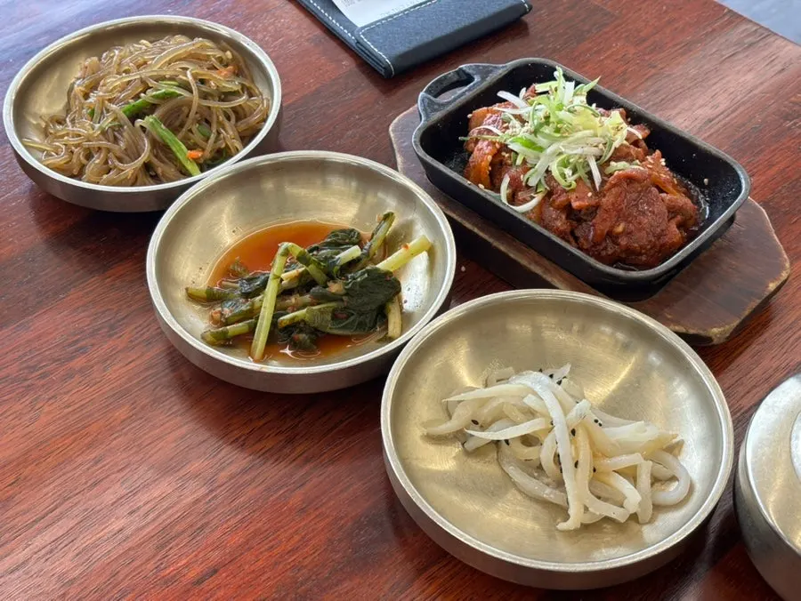 Cucumber salad, doraji salad, and other side dishes