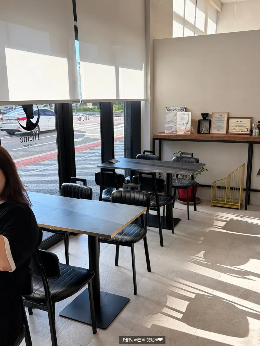 Café interior operated alongside a furniture showroom