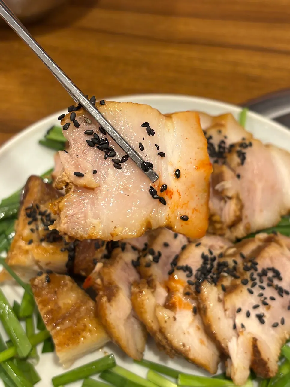 Sliced boiled pork served before the kal-nakji