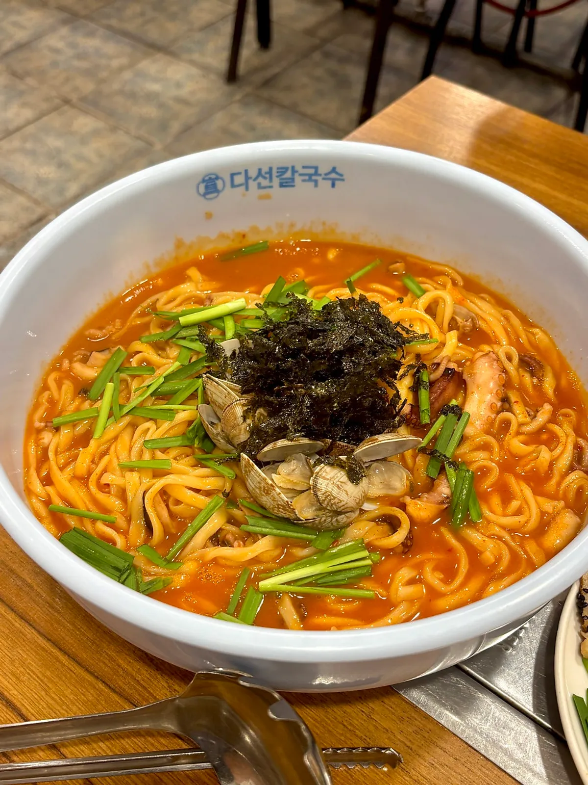 Subtly herbal boiled pork served with kimchi