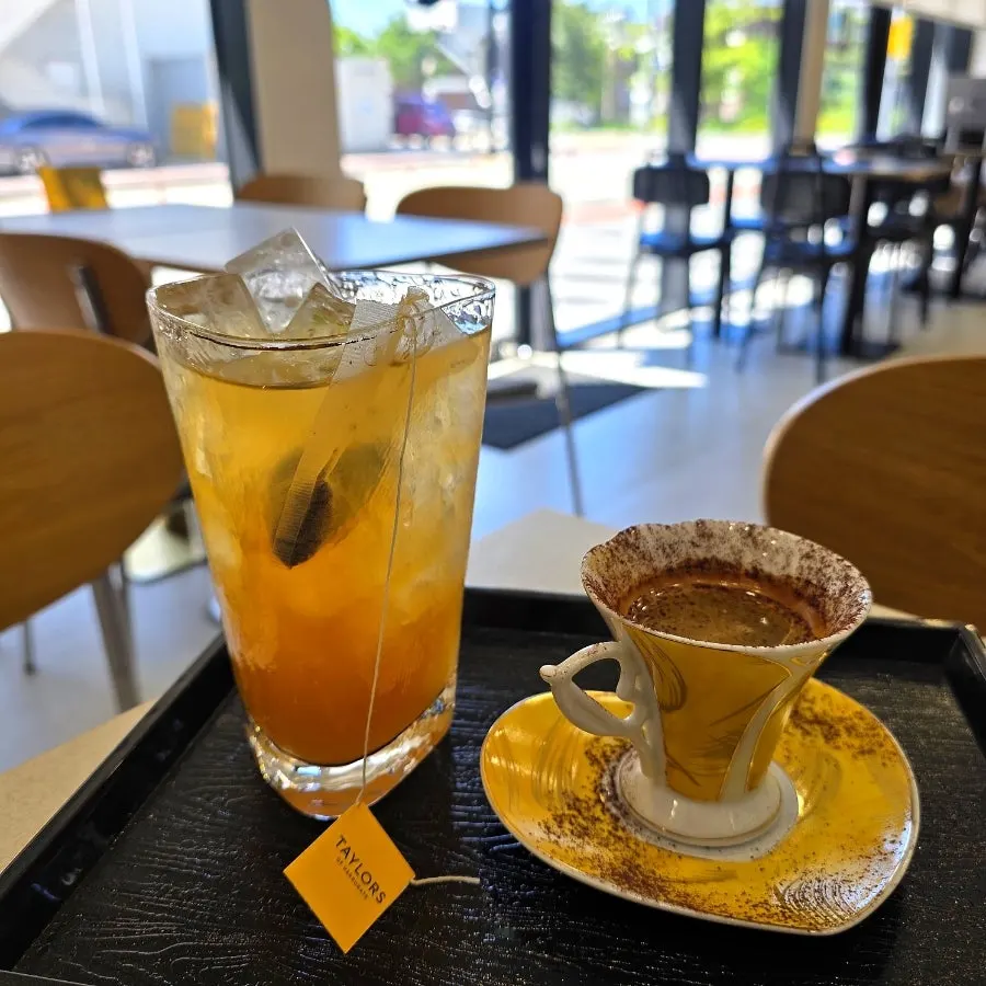The croffle, peach iced tea, and espresso together