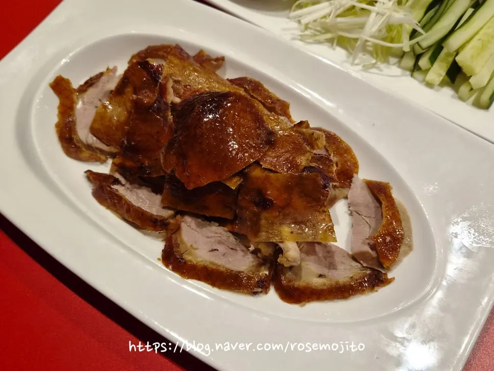 Peking duck wrapped in a wheat pancake