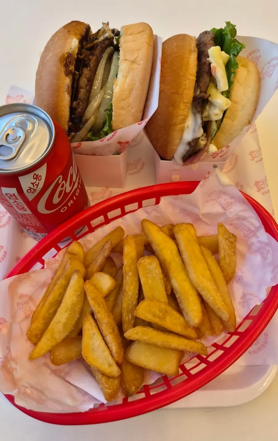 Vertical photo of the exterior of 666 Burger Main Branch
