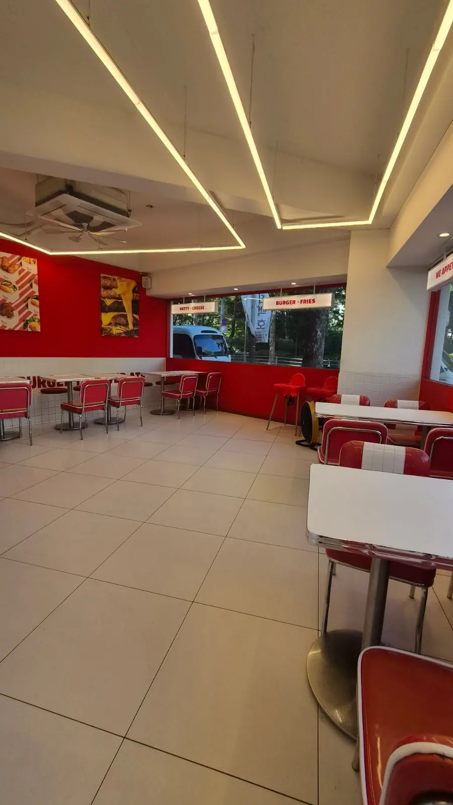Spacious hall seating at 666 Burger Main Branch
