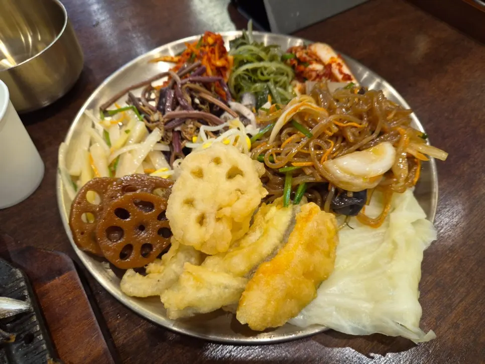 Plate of namul and fritters brought from the self-serve bar