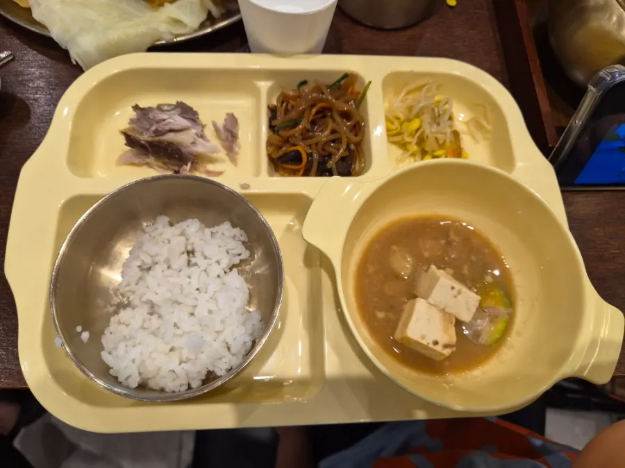 White rice and side dishes portioned for the child