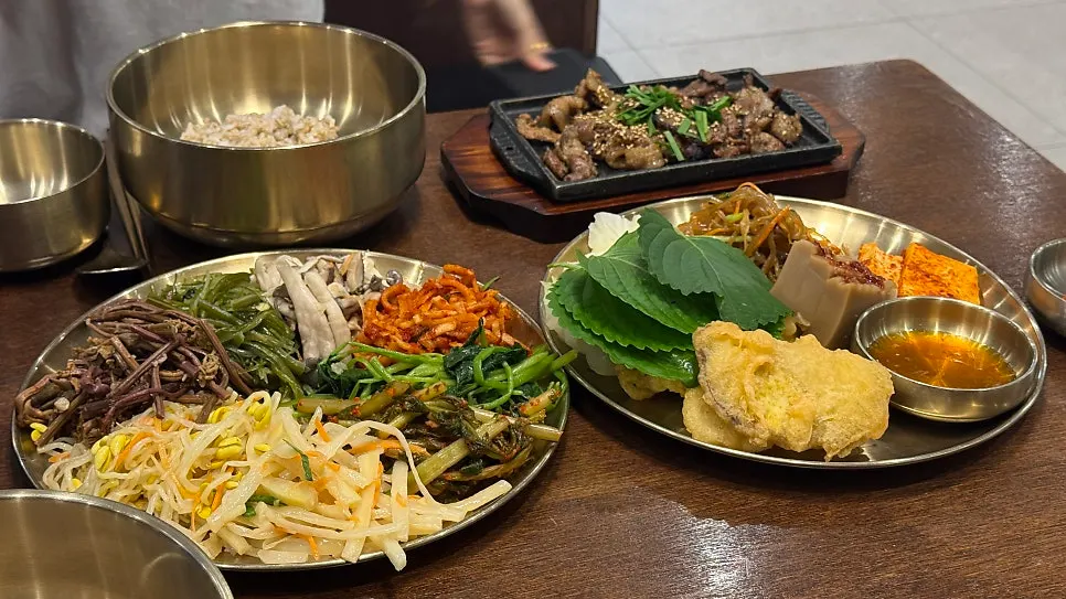 Sesame oil and gochujang set out on the table