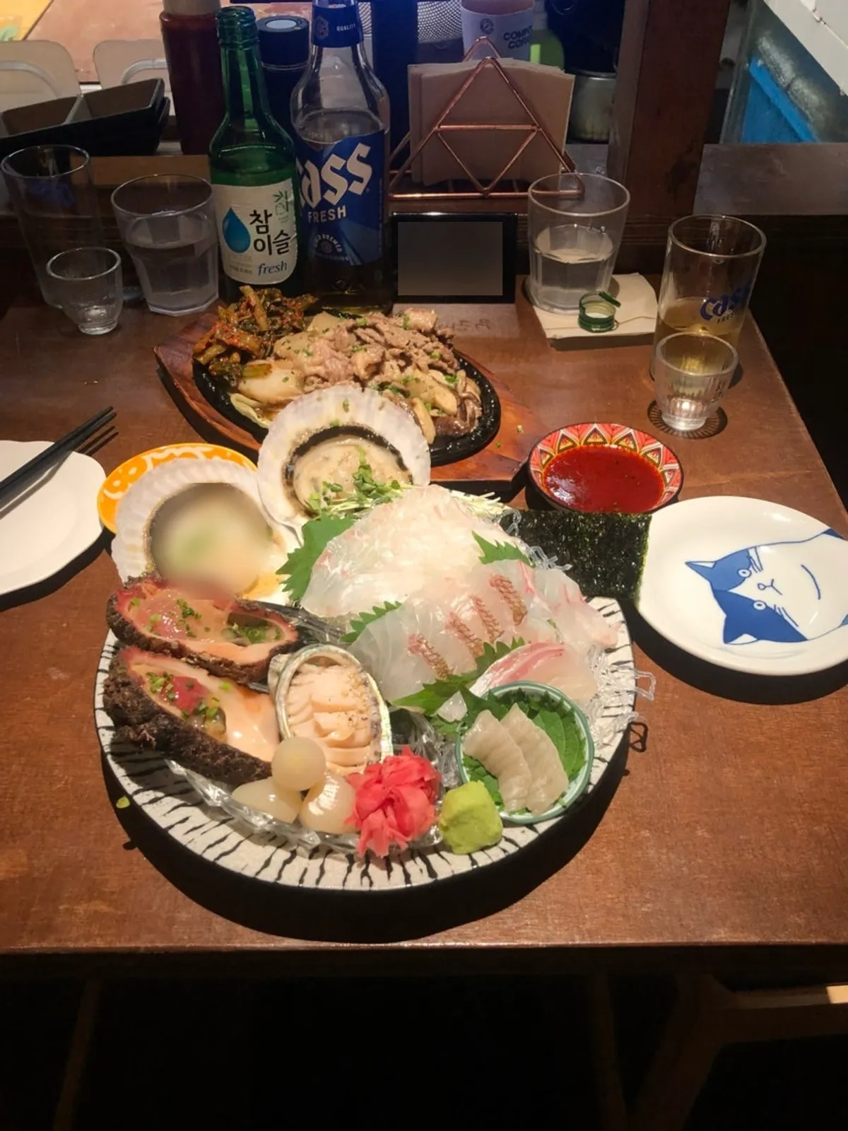 Susan Jang assorted platter served with soju and beer