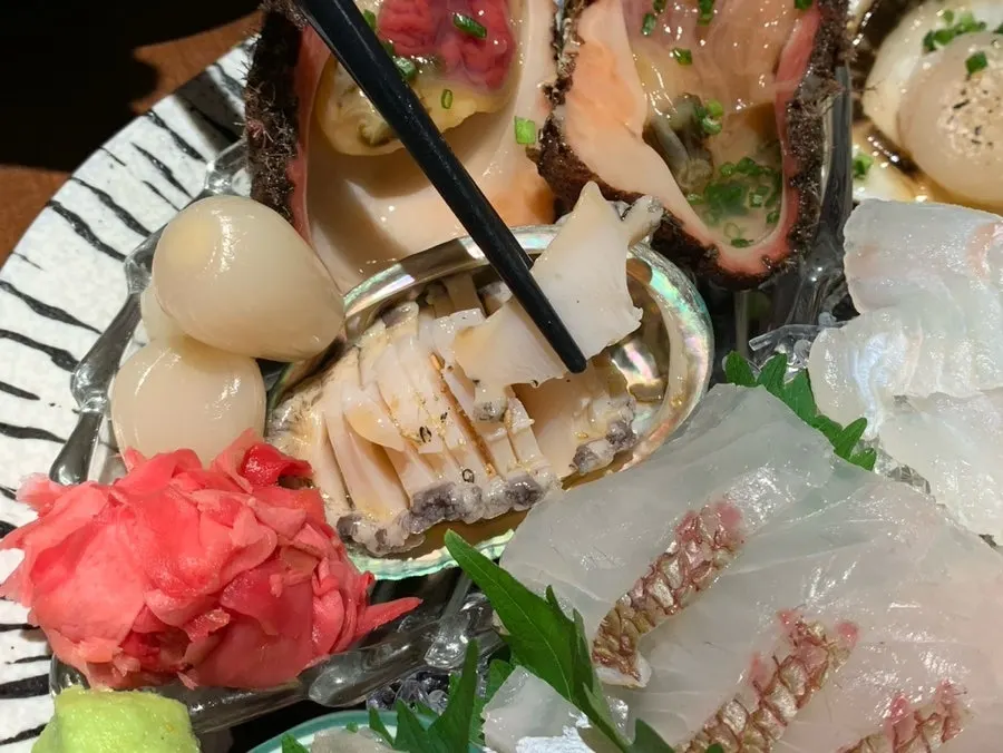 Abalone sashimi included in the assorted platter