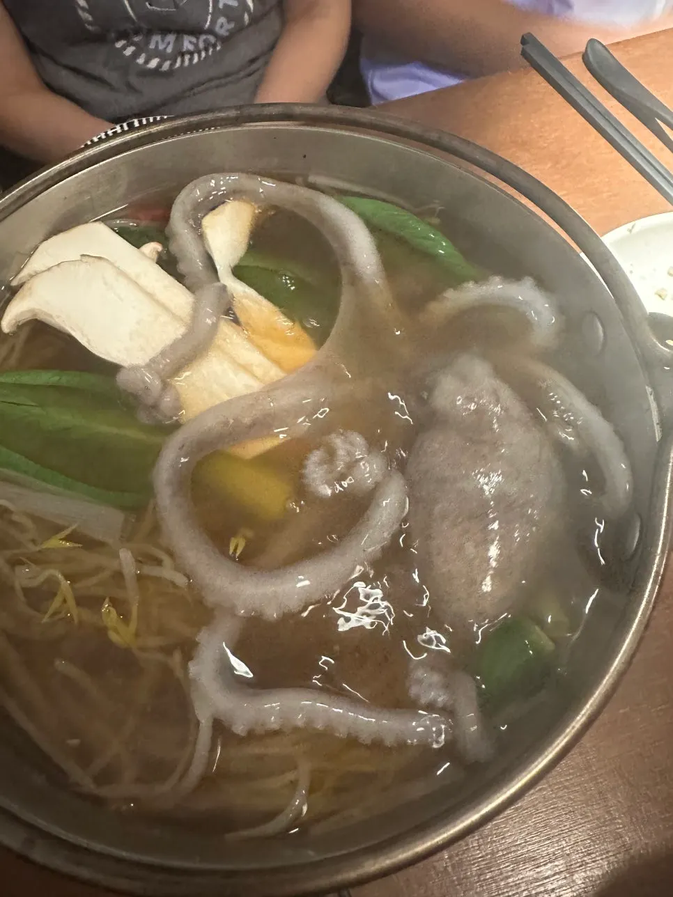 Live octopus dropped into the boiling broth