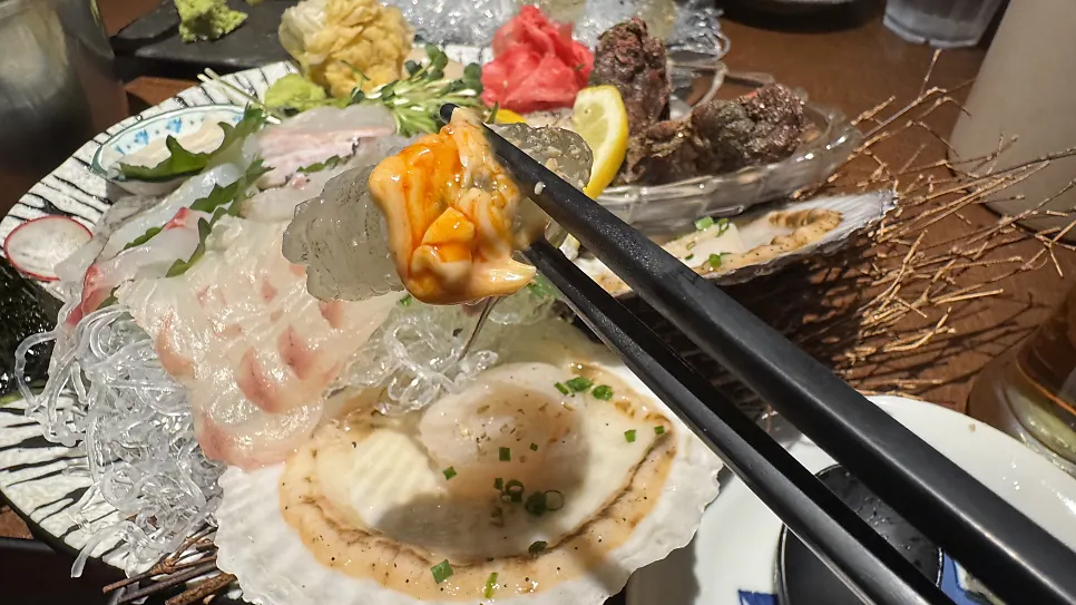 Chili sauce served with the live shrimp sashimi