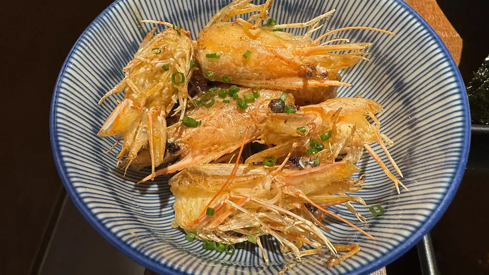 Butter-grilled shrimp heads, ordered for an extra ₩3,000