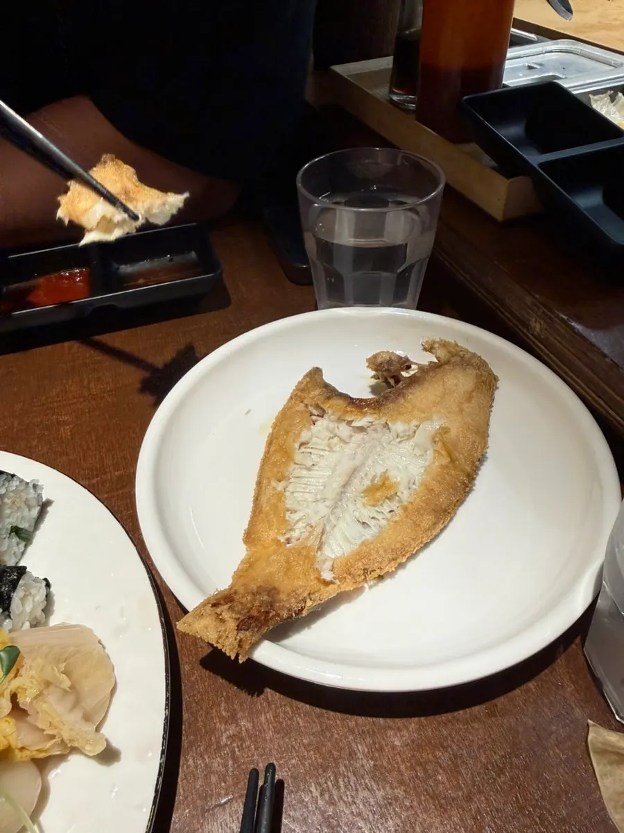 Fried flounder served as the complimentary side dish