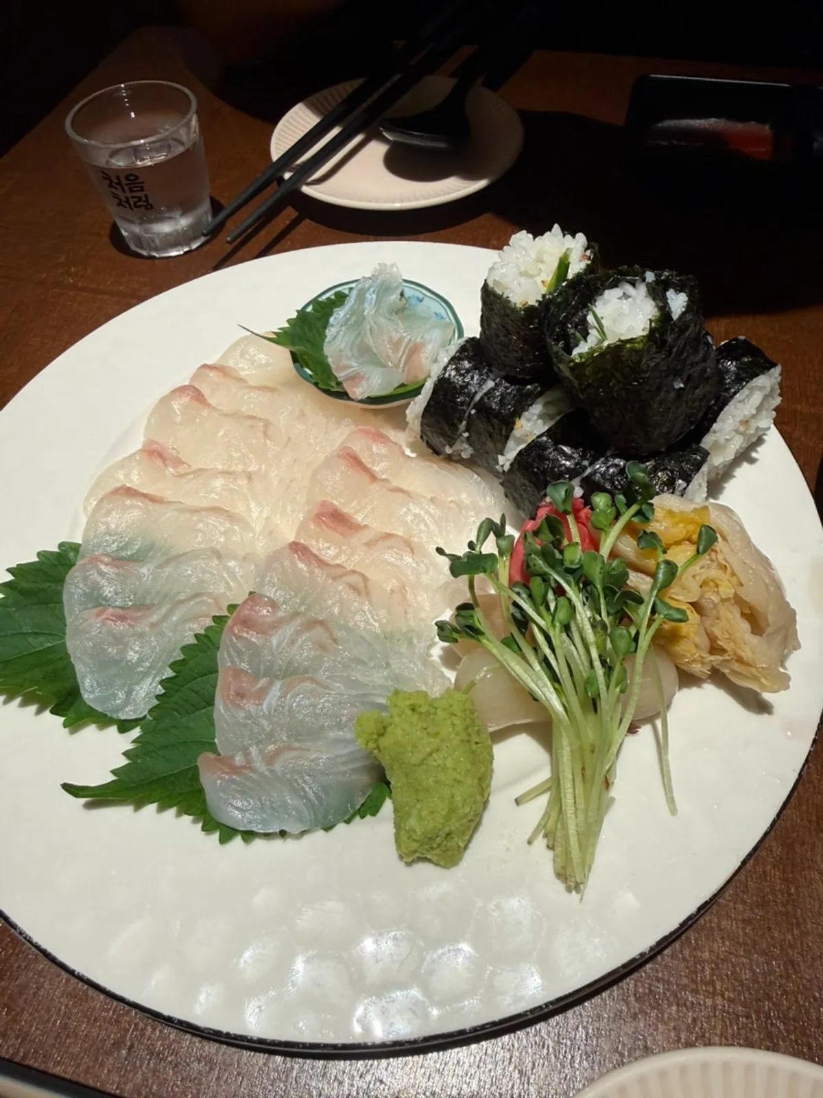 Plating of flounder sashimi and salt gimbap