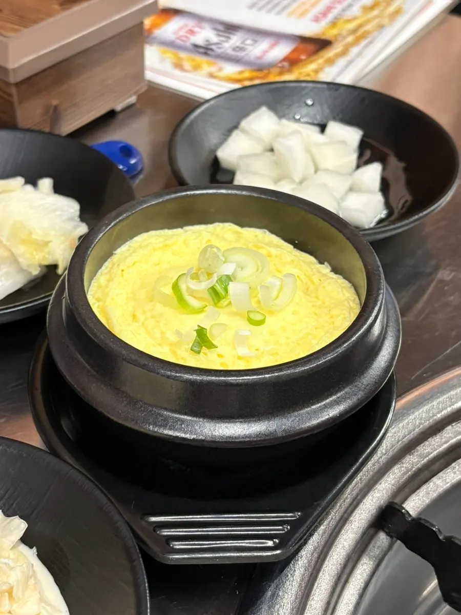 Basic side dishes including pickled radish and white kimchi