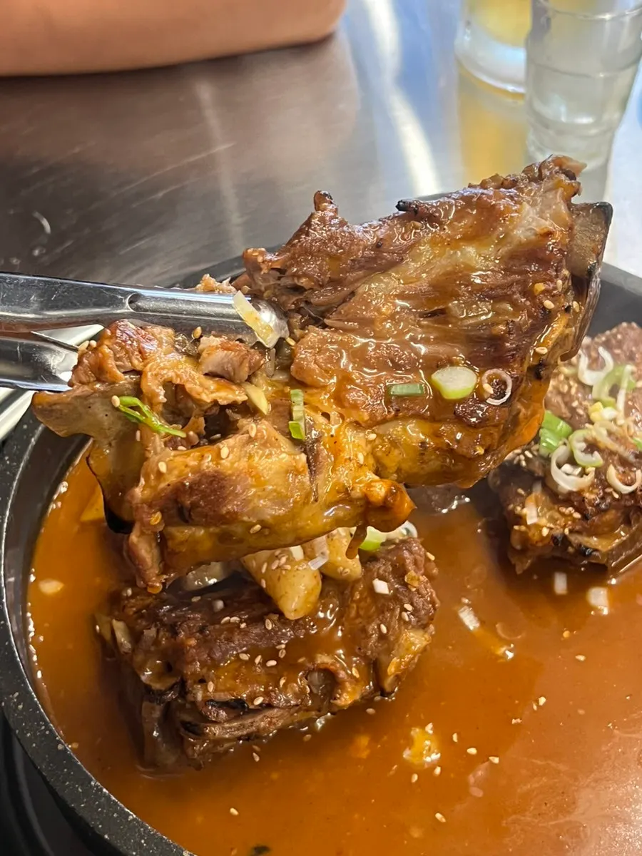 Grilled bones eaten with rice balls