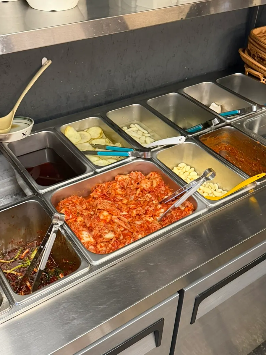 Self-serve corner for potatoes, eggplant, and mushrooms